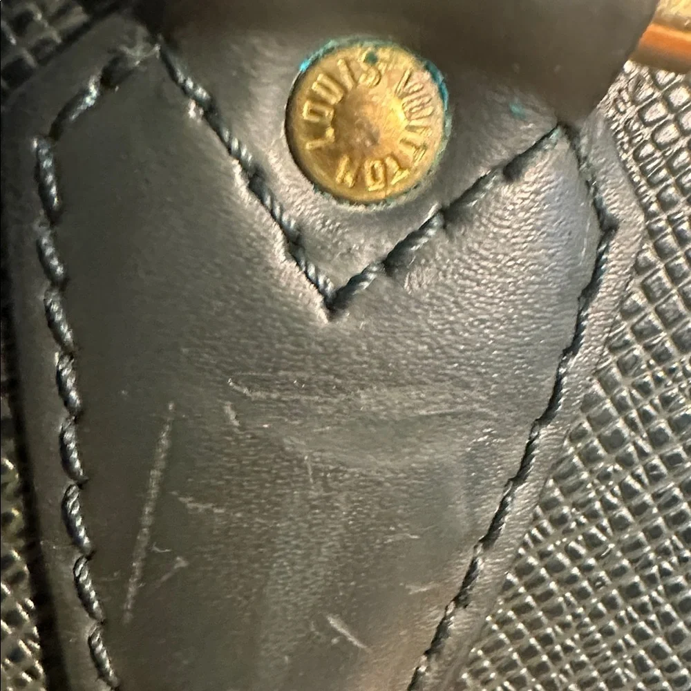 Louis Vuitton Taiga Porte Document Rosan leather briefcase Epicea.